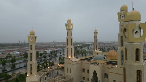 Landmarks and mosques of the city of Tabuk, drone photography of the flood in the city of Tabuk, gathering of rainwater in the middle of the area, famous tourist attractions, places and areas of tourism in the Kingdom of Saudi Arabia.