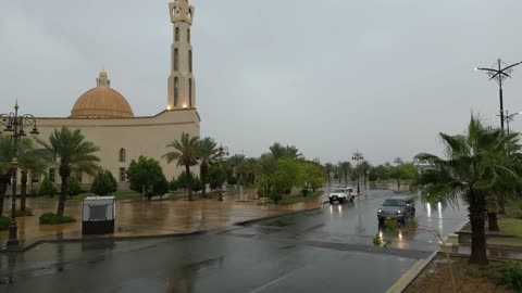 Landmarks and mosques of the city of Tabuk, drone photography of the flood in the city of Tabuk, gathering of rainwater in the middle of the area, famous tourist attractions, places and areas of tourism in the Kingdom of Saudi Arabia.
