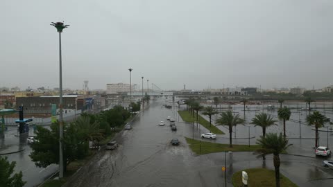 Urban development and construction in the city of Tabuk, tourist places and areas in the Kingdom of Saudi Arabia, drone footage of the flood in the city of Tabuk, rainwater accumulation in the middle of the area, famous tourist landmarks.
