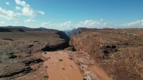 Tourist landmarks and areas, the flow of torrents after heavy rainfall, the Shaq Waterfalls in the west of Tabuk city in the Kingdom of Saudi Arabia, the mountains, deserts, and coasts, nature in Tabuk, the beauty of Tabuk city in Saudi Arabia.