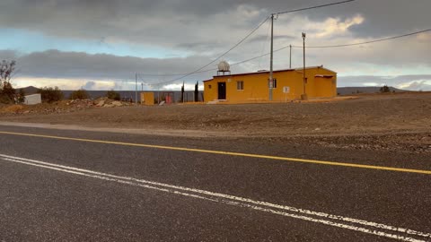Hail (small snowflakes) fell over the volcanic harrahs in Tabuk, with a foggy winter atmosphere in the sky of the city of Hura Tabuk in the Kingdom of Saudi Arabia.
