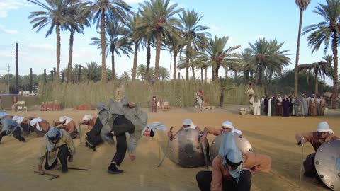Showcasing the life journey of the Babylonian king, the Mamalik event in the province of Tayma, the royal history of the ancient city of Tayma, the festival of ancient kingdoms, presenting a theatrical performance, preserving the historical heritage, wearing traditional old attire.