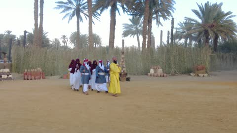 Showcasing the life journey of the Babylonian king, the Mamalik event in the province of Tayma, the royal history of the ancient city of Tayma, the festival of ancient kingdoms, presenting a theatrical performance, preserving the historical heritage, wearing traditional old attire.