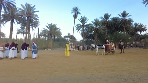 Showcasing the life journey of the Babylonian king, the Mamalik event in the province of Tayma, the royal history of the ancient city of Tayma, the festival of ancient kingdoms, presenting a theatrical performance, preserving the historical heritage, wearing traditional old attire.