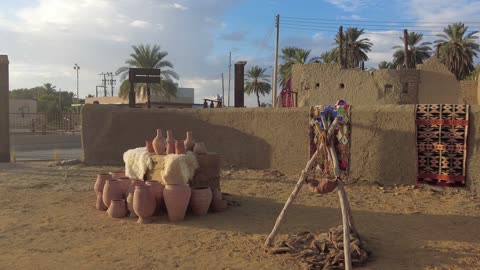 Clay pottery, the Mamalik event in the province of Tayma, the royal history of the ancient city of Tayma, the festival of ancient kingdoms, preserving the historical heritage, the traditional clay house.