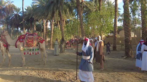 Showcasing the life journey of the Babylonian king, the Mamalik event in the province of Tayma, the royal history of the ancient city of Tayma, the festival of ancient kingdoms, presenting a theatrical performance, preserving the historical heritage, wearing traditional old attire.