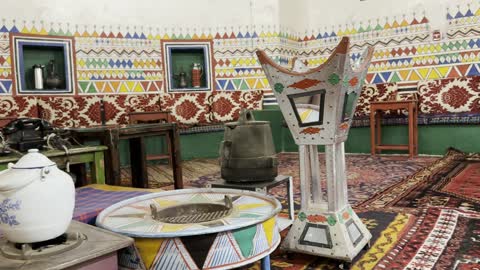 A cultural and tourist experience for families and visitors, Saudi architectural heritage, a prominent cultural and tourist destination in the Kingdom of Saudi Arabia, the popular village in the city of Dammam on December 29, 2025, the Global Village in Dammam, a heritage event with an authentic folk character.