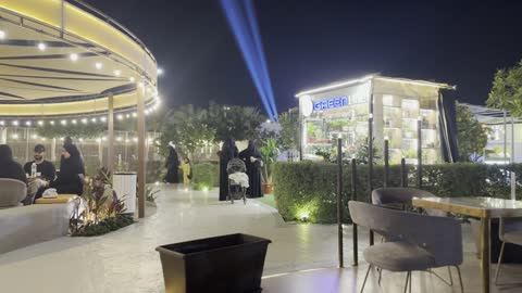 Seedlings and plants displayed in different pots, famous tourist attractions, the tourist waterfront in the Kingdom of Saudi Arabia in the city of Jubail Industrial, Jubail Corniche, a café and a place with innovative lights.