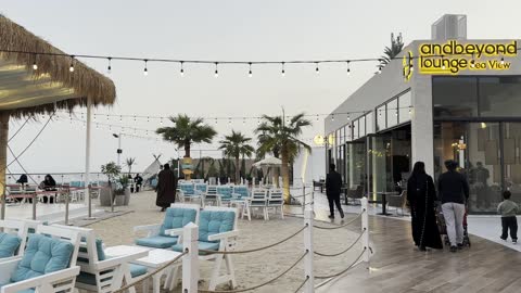 Hanging lights and lamps to create a comfortable evening atmosphere, the tourist waterfront in the Kingdom of Saudi Arabia in the city of Jubail Industrial on December 28, 2025, a collection of restaurants and cafes overlooking the sea, Jubail Corniche, famous tourist attractions.