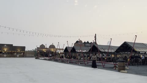 Seating areas and cafes at the Jeddah Season, and Winter Wonderland in the Al-Shatea neighborhood in Jeddah, Saudi Arabia on December 19, 2025, entertainment games and interactive experiences, live shows and enjoyable lights, festive snowy atmosphere.