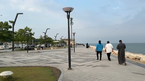 The Hams Walkway in the city of Dammam in the Eastern Province on December 28, outdoor seating and benches, practicing walking, a calm family atmosphere, children having a good time, an open recreational destination, space for walking and relaxation.
