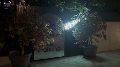 The focus on planting green plants around the existing restaurants, a seaside promenade, and sandy beaches, the Red Sea in the north of Jeddah city in the Kingdom of Saudi Arabia, December 2025, the tourist Gulf, photography of the Jeddah Corniche, places and tourist landmarks.