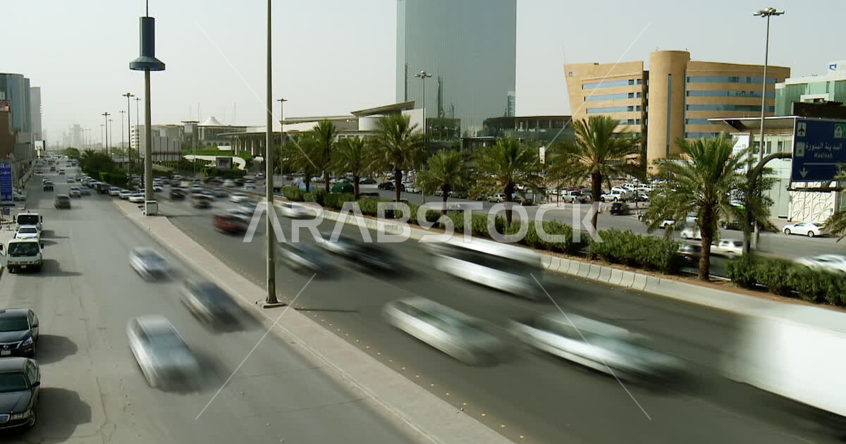Time lapses for car traffic on the highway during the day in the city ...