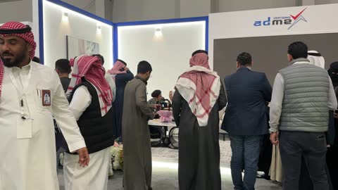 Photographers document the events of the Designers and Design Exhibition in the Eastern Province on December 29, 2025, Saudi Arabia, a creative platform for fashion and design, direct interaction with visitors, the latest fashion trends and accessories, highlighting identity and innovation.
