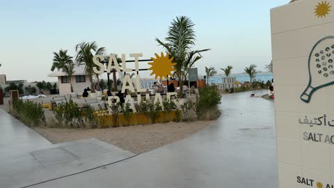 Recreational events and activities at Salt Beach on the Corniche in Al Khobar, Eastern Province, Saudi Arabia, tourist restaurants and cafes, a calm atmosphere and a pleasant relaxation experience, sea-view seating, a family-friendly coastal beach destination.