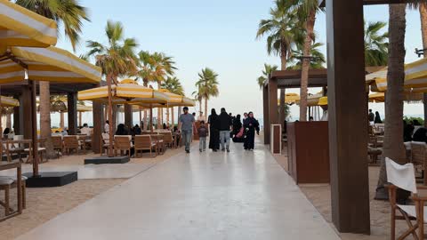 A family-friendly beach coastal destination, tourist restaurants and cafes at Salt Beach on the Corniche in Al Khobar, Eastern Province, Saudi Arabia, with a calm atmosphere and enjoyable relaxation experience, sea-view seating, events, and recreational activities.
