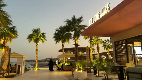 Tourist restaurants and cafes in Salt Al-Bahr on the Corniche of Khobar in the Eastern Province, Kingdom of Saudi Arabia, with sea-view seating, a family-friendly coastal beach destination, a calm atmosphere, and a pleasant relaxation experience, along with events and recreational activities.