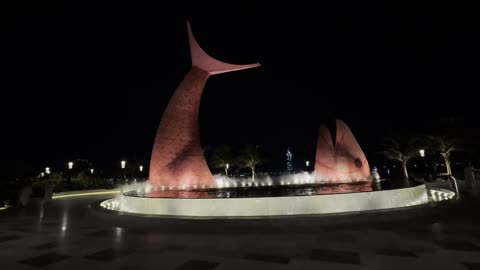 Famous tourist attractions in the Kingdom, a huge steel fish sculpture on the Jeddah Corniche, Saudi Arabia, urban art and contemporary architectural design.