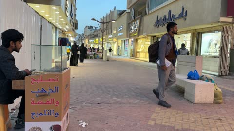 Jewelry stores and local commercial goods in the Love Market in Dammam, Eastern Province, Saudi Arabia, cultural heritage and traditional trade, various food stalls.