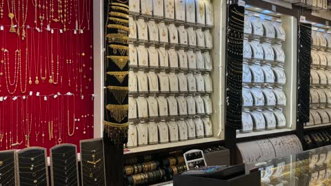 Jewelry stores and local commercial goods in the Love Market in Dammam, Eastern Province, Saudi Arabia, cultural heritage and traditional trade, various food stalls.