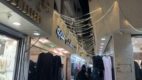 Cultural heritage and traditional trade in the Love Market in Dammam, Eastern Province, Saudi Arabia, local commercial shops, and various food stalls.