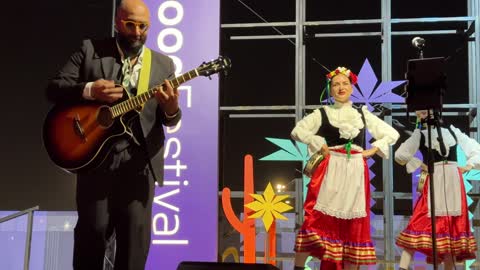 A Mexican folk dance performance at a food festival in the outdoor gardens of Ithra in Dhahran, Eastern Province, Saudi Arabia, on December 28, 2025. Enjoyable outdoor sessions, international and local restaurants, a global dining experience, and a family-friendly and entertaining atmosphere.