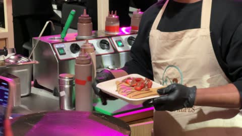 A global food experience at a food festival in the Ithra outdoor gardens in Dhahran, Eastern Province, Saudi Arabia, on December 28, 2025, enjoyable outdoor sessions, international and local restaurants, family-friendly and entertaining atmosphere.