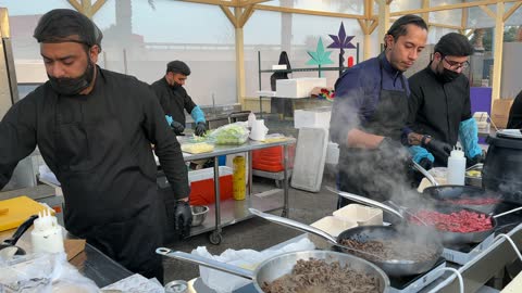 International and local restaurants at a food festival in the Ithra outdoor gardens in Dhahran, Eastern Province, Saudi Arabia, on December 28, 2025, enjoyable outdoor seating, global dining experience, family-friendly and entertaining atmosphere.