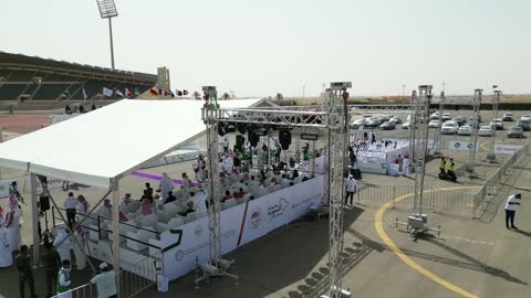 Rally race event in the Kingdom of Saudi Arabia, the championship and sports activities in the city of Tabuk, car speed race, preparing the venue for enjoyable recreational youth sports, competition and rivalry to achieve victory, the turns and directions for the competing cars.