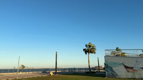 The waterfront in Dammam city, Eastern Province, Saudi Arabia, offers various recreational and sports activities, restaurants and cafes overlooking the sea, a coastal promenade, and outdoor seating. It is a tourist and entertainment landmark open to the Arabian Gulf, providing a calm and unique family atmosphere.