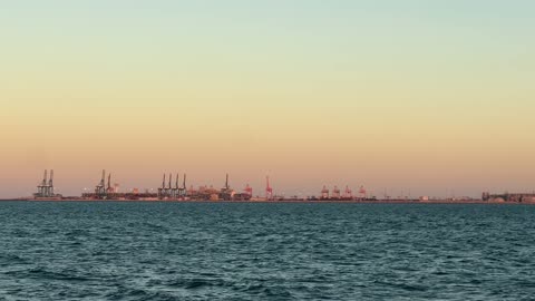 The waterfront in Dammam city, Eastern Province, Saudi Arabia, offers various recreational and sports activities, restaurants and cafes overlooking the sea, a coastal promenade, and outdoor seating. It is a tourist and entertainment landmark open to the Arabian Gulf, providing a calm and unique family atmosphere.