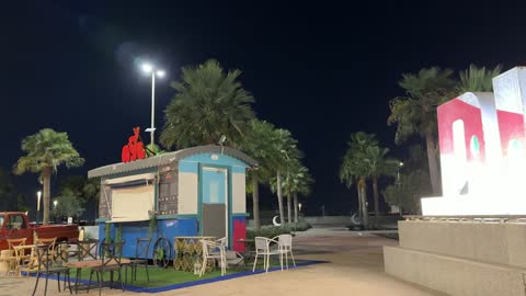 A tourist and entertainment landmark overlooking the Arabian Gulf, the waterfront in the city of Dammam, Eastern Province, Kingdom of Saudi Arabia, offers various recreational and sports activities, restaurants and cafes overlooking the sea, a coastal promenade, and outdoor seating, with a calm and unique family atmosphere.