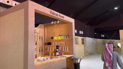 Food product stores at the King Abdulaziz Falcon Festival – Riyadh, Saudi Arabia on January 4, 2026, a national heritage event that reflects the culture of Saudi falconry, featuring shows and competitions for falcons, wide participation from falconers, a heritage atmosphere that combines authenticity and identity, one of the most prominent cultural festivals in the kingdom.