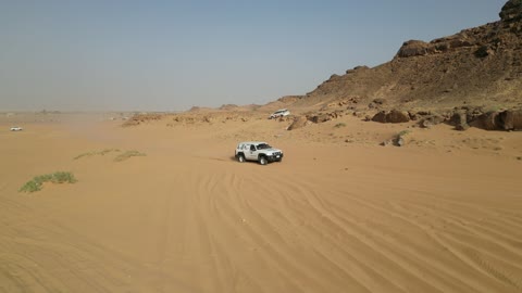 Challenges for drivers attract a select group of participants, competition with diverse terrains in Tabuk, rally racing event in the Kingdom of Saudi Arabia, car speed racing, preparing the venue for enjoyable youth recreational sports, the turns and directions for the competing cars.