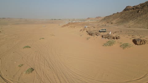 Challenges for drivers attract a select group of participants, competition with diverse terrains in Tabuk, rally racing event in the Kingdom of Saudi Arabia, car speed racing, preparing the venue for enjoyable youth recreational sports, the turns and directions for the competing cars.