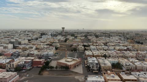 أمطار وبروق تبوك خلال فصل الشتاء، منخفض جوي، امطار شتوية، أماكن ومناطق السياحة في المملكه العربية السعودية، تصوير درون للسيل في مدينة تبوك , تجمع مياه الأمطار وسط المنطقة, معالم سياحية مشهورة