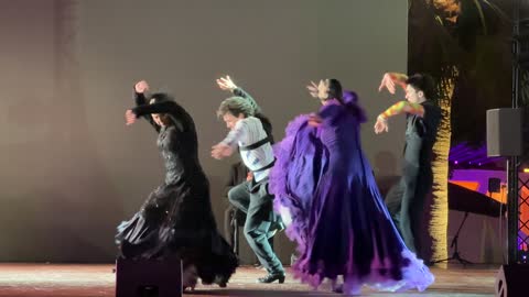 A complete cultural and entertainment experience inspired by the Spanish character, featuring a Spanish folk dance performance at the Spanish neighborhood event in the King Abdulaziz Center for World Culture "Ithra" in Dhahran, Eastern Province, Saudi Arabia, on January 12, 2026, with Flamenco dances and interactive activities, creating a vibrant festive atmosphere.