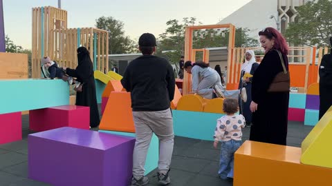 Recreational activities for families and children at the Spanish neighborhood event at the King Abdulaziz Center for World Culture "Ithra" in Dhahran, Eastern Province, Saudi Arabia, on January 13, 2026, with a vibrant festive atmosphere, Spanish food restaurants and cafes, flamenco dances, and interactive events.