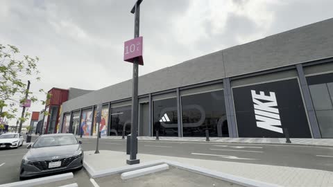 A brand in the YU Walk area in Jeddah, Saudi Arabia, on February 15, 2024, featuring international and local restaurants and cafes, a comprehensive urban destination for walking, entertainment, and shopping, seasonal events and recreational activities, with a vibrant family and youth atmosphere.