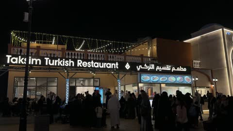 Cultural diversity and entertainment in the Global Village in the Eastern Province, Saudi Arabia, on December 29, 2025, local and global brands, artistic and folk performances, various restaurants and cafes, a comprehensive cultural and entertainment event, family activities, and interactive experiences.