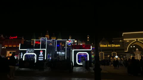 Local and international brands at the Global Village in the Eastern Province, Kingdom of Saudi Arabia, on December 29, 2025, artistic and popular performances, various restaurants and cafes, cultural and entertainment diversity, a pavilion for different cultures and countries, a comprehensive cultural and entertainment event, family activities and interactive experiences.