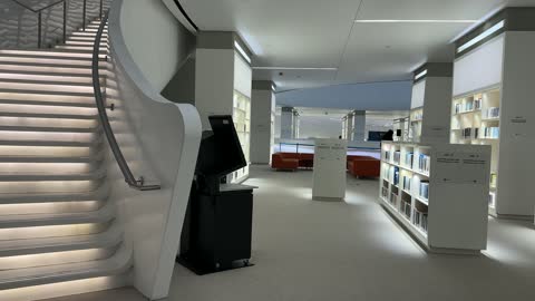 The use of stairs in the Ithra Library in Dhahran City in the Eastern Province of the Kingdom of Saudi Arabia, the King Abdulaziz Center for World Culture, a beacon of culture and thought, exhibitions and libraries, architectural engineering art, a famous cultural landmark, tourism in Saudi Arabia.