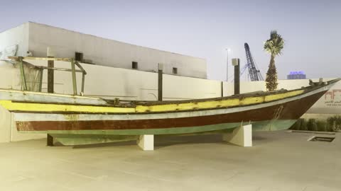 An Arab sailing ship in the real Bab al-Bont port in the historic city of Jeddah, Saudi Arabia, has been renovated and recently known as the "Red Sea Museum" on December 6, 2025. It is a historical maritime landmark on the Red Sea coast, one of the oldest ports in Jeddah, historically significant for trade and receiving pilgrims, representing the maritime heritage and economic history of the city.