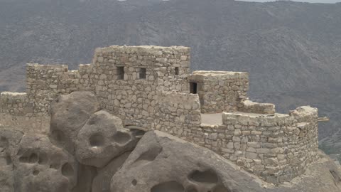 The formation and sandy shaping in the desert, the landscapes and soft golden sands in the desert, the soft golden dunes and natural terrain in the Kingdom of Saudi Arabia, rock in the Saudi Arabian desert, nature background.