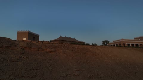 An ideal environment for family outings, the development project of historic Diriyah in Riyadh, Saudi Arabia, the heritage village and archaeological buildings, a center and a famous cultural and historical tourist landmark in the evening, the illuminated Al-Bujairi Park and overlook during the day.