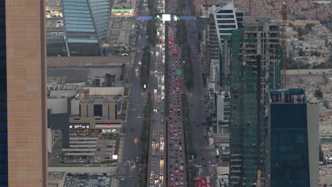 Urban growth and development, and civilizational progress, the architectural engineering art in building skyscrapers and towers, a famous tourist landmark in the Kingdom of Saudi Arabia, aerial photography using drone technology of the Burj Al-Majdoul building in Riyadh during the day.