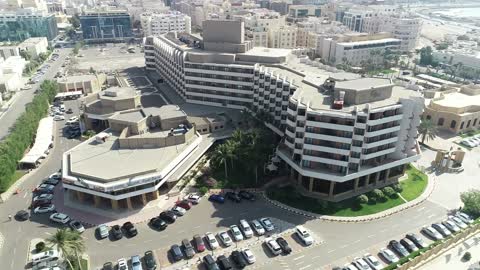 A view of the Red Sea coast and the famous King Fahd Fountain, Arab heritage and modern luxury, drone footage of the InterContinental Hotel Jeddah, a strategic location on the Corniche Road.