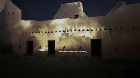 Famous archaeological recreational tourist places, the old clay walls of Diriyah, heritage tourist sites and landmarks, the walls of the Salwa Palace in old Diriyah, celebrations and festivals in Riyadh in the Kingdom of Saudi Arabia, the illuminated overlook and park of Al-Bujairi in the Al-Turaif neighborhood at night.
