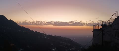 Natural tourist places and landmarks, trees and plants and areas of green nature, agricultural terraces on the mountain slopes, the Jabal Fayfa in Jazan at sunset in the south of the Kingdom of Saudi Arabia, peaks and rocky elevations.