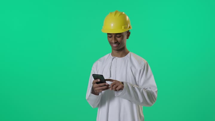 Middle Eastern Engineer Using Smartphone Green Screen